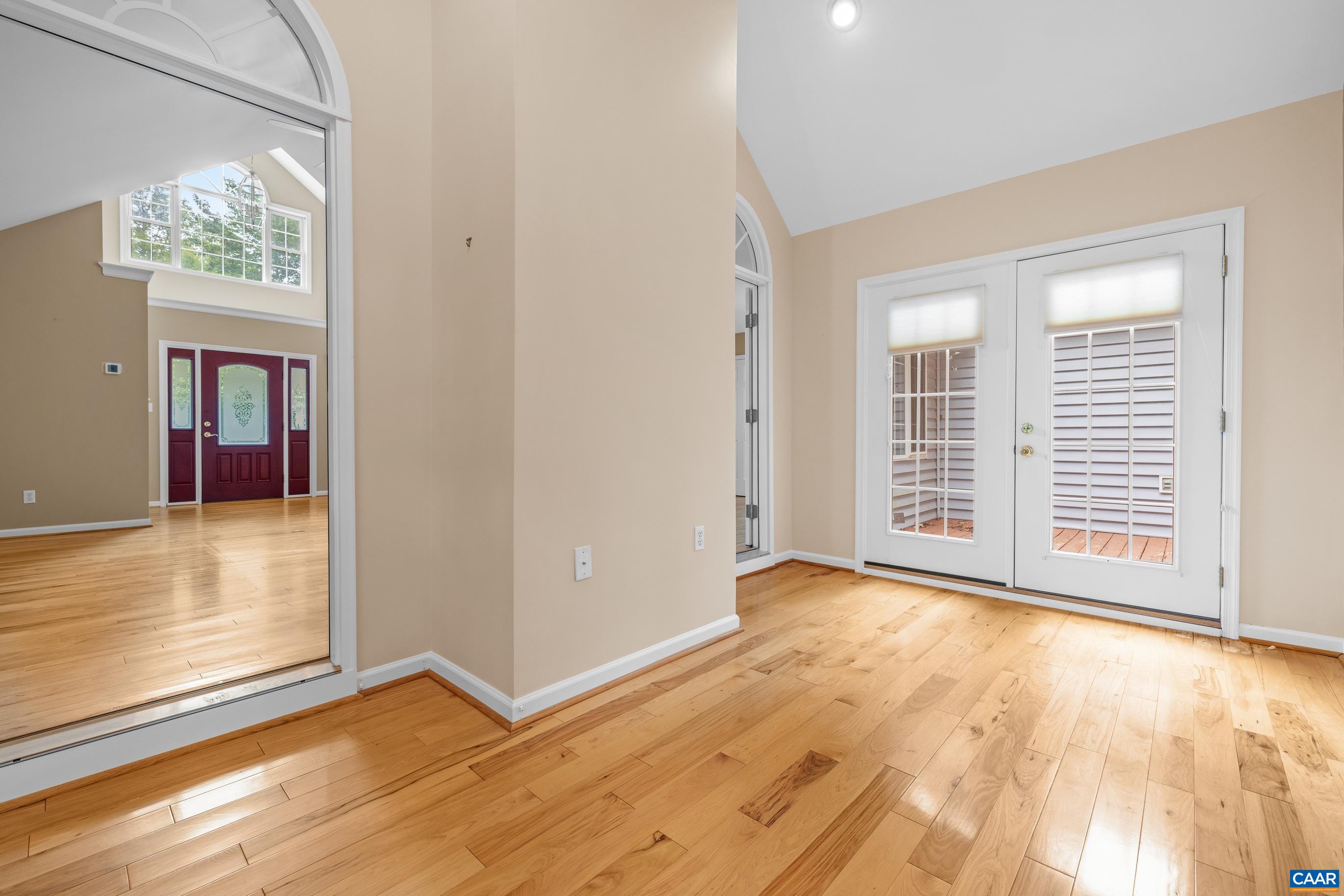 34 Zephyr Road Palmyra, VA 22963 - Photo 18 of 38 an empty room with wooden floor and windows