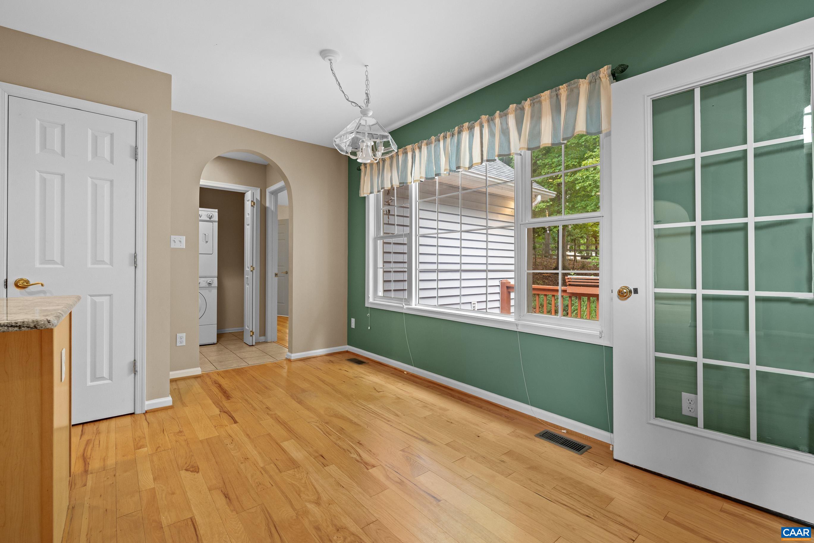 34 Zephyr Road Palmyra, VA 22963 - Photo 19 of 38 a view of an empty room with a window and wooden floor