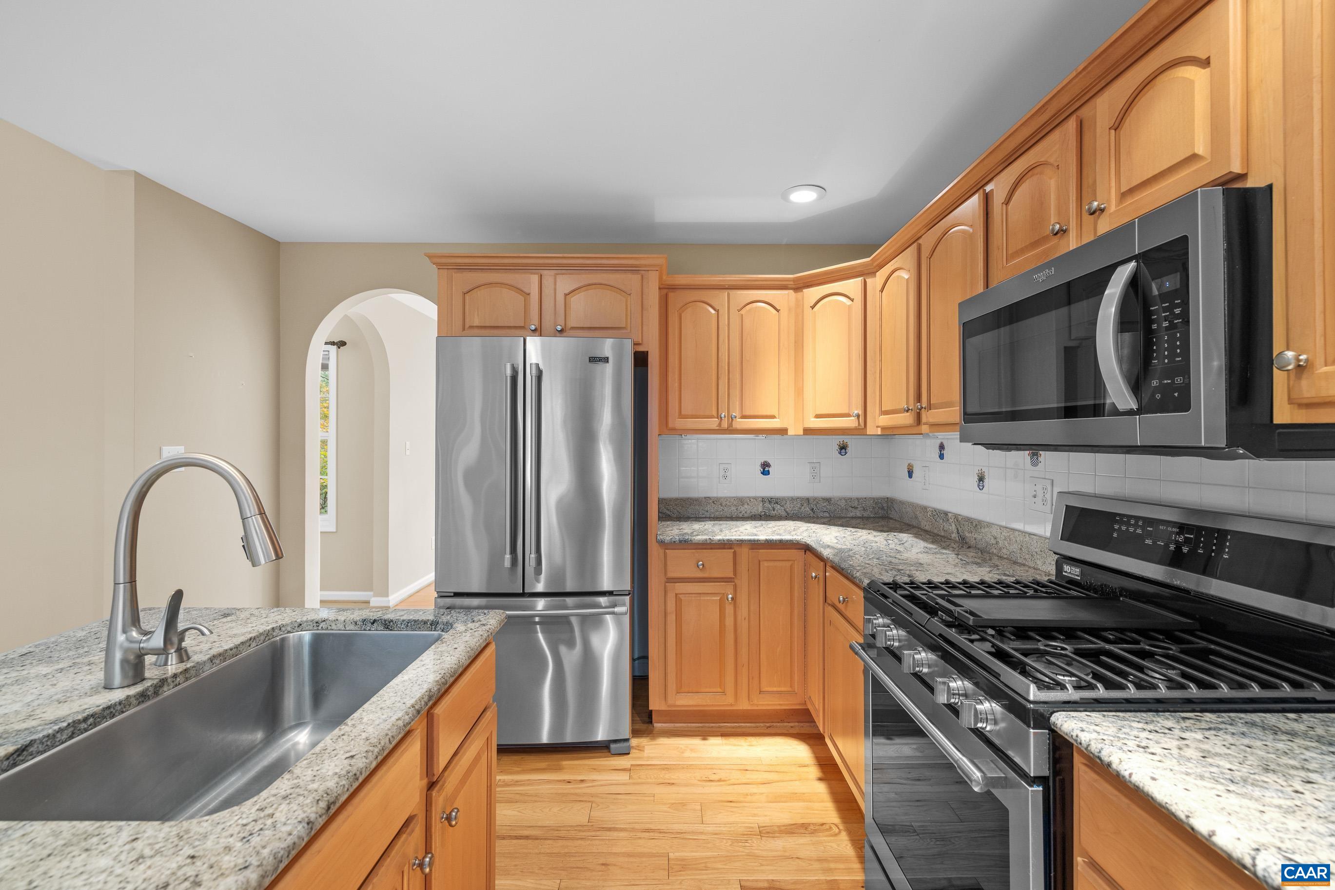 34 Zephyr Road Palmyra, VA 22963 - Photo 24 of 38 a kitchen with a sink stove and refrigerator