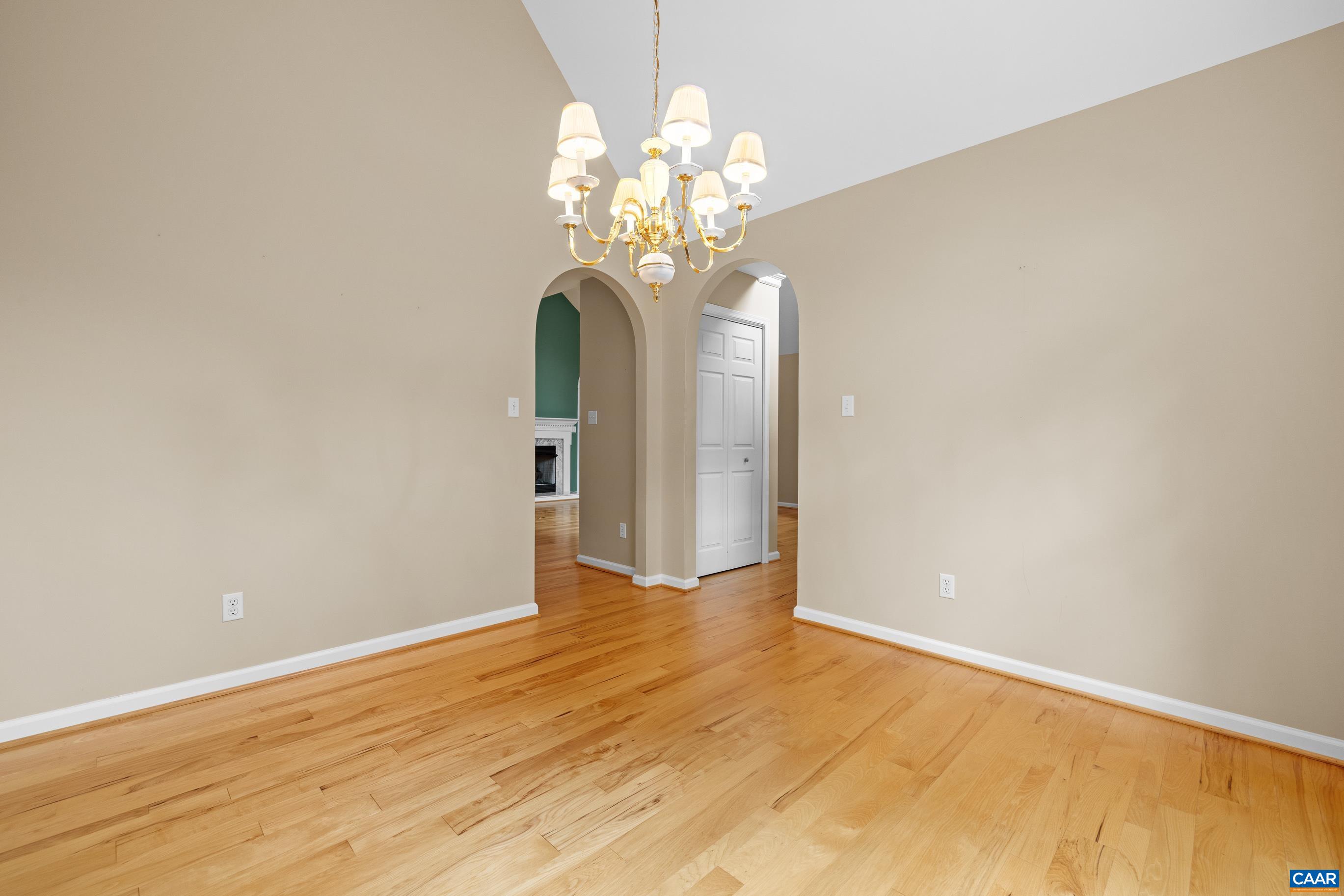 34 Zephyr Road Palmyra, VA 22963 - Photo 27 of 38 a view of a chandelier in big room with wooden floor