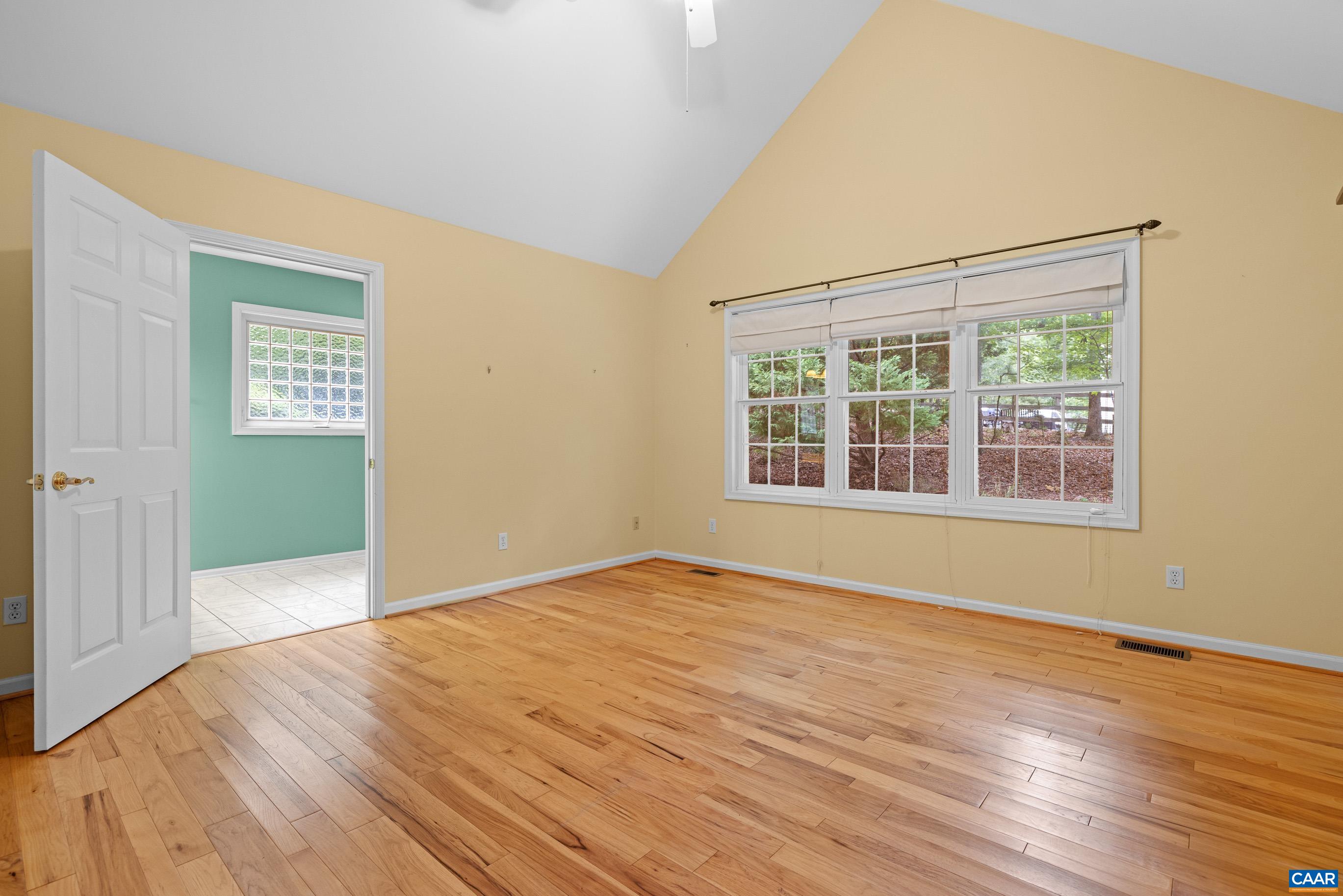 34 Zephyr Road Palmyra, VA 22963 - Photo 28 of 38 a view of an empty room with wooden floor and a window