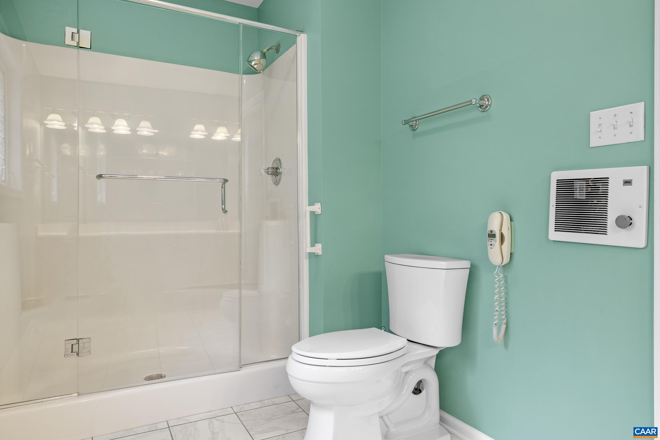 34 Zephyr Road Palmyra, VA 22963 - Photo 32 of 38 a bathroom with a toilet and a shower