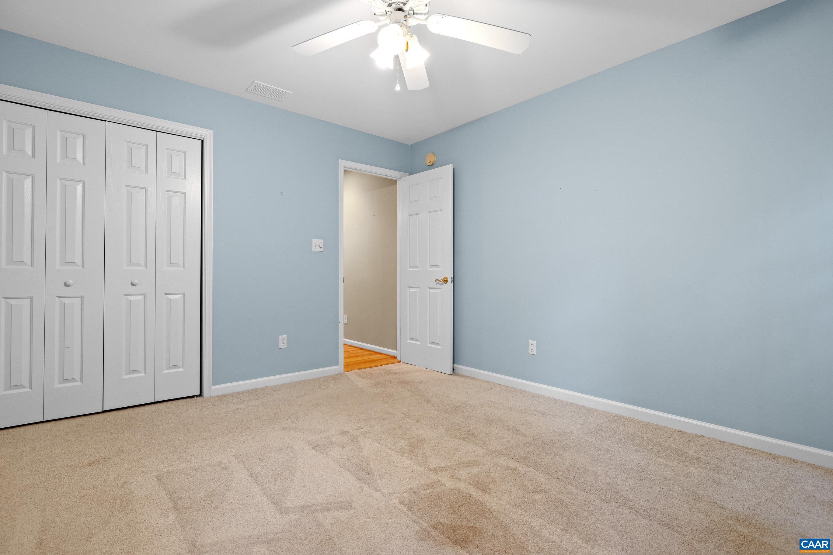 34 Zephyr Road Palmyra, VA 22963 - Photo 38 of 38 an empty room with closet and chandelier fan
