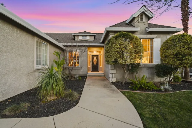 a front view of a house with a porch