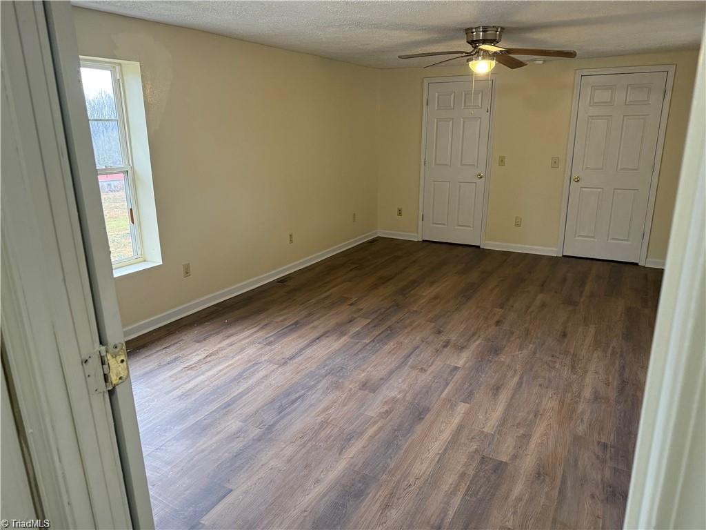 2115 Ararat Road Ararat, NC 27007 - Photo 30 of 50 large master bedroom with closet across the whole end of room