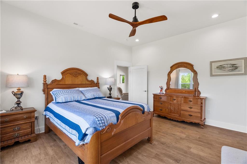 876 Cline Road Resaca, GA 30735 - Photo 26 of 57 a bedroom with a bed and a dresser