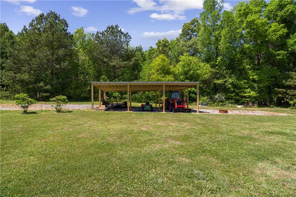 876 Cline Road Resaca, GA 30735 - Photo 46 of 57 a view of house with outdoor space and garden