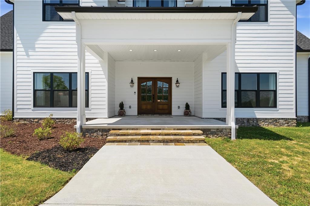 876 Cline Road Resaca, GA 30735 - Photo 6 of 57 a view of a house with backyard and porch