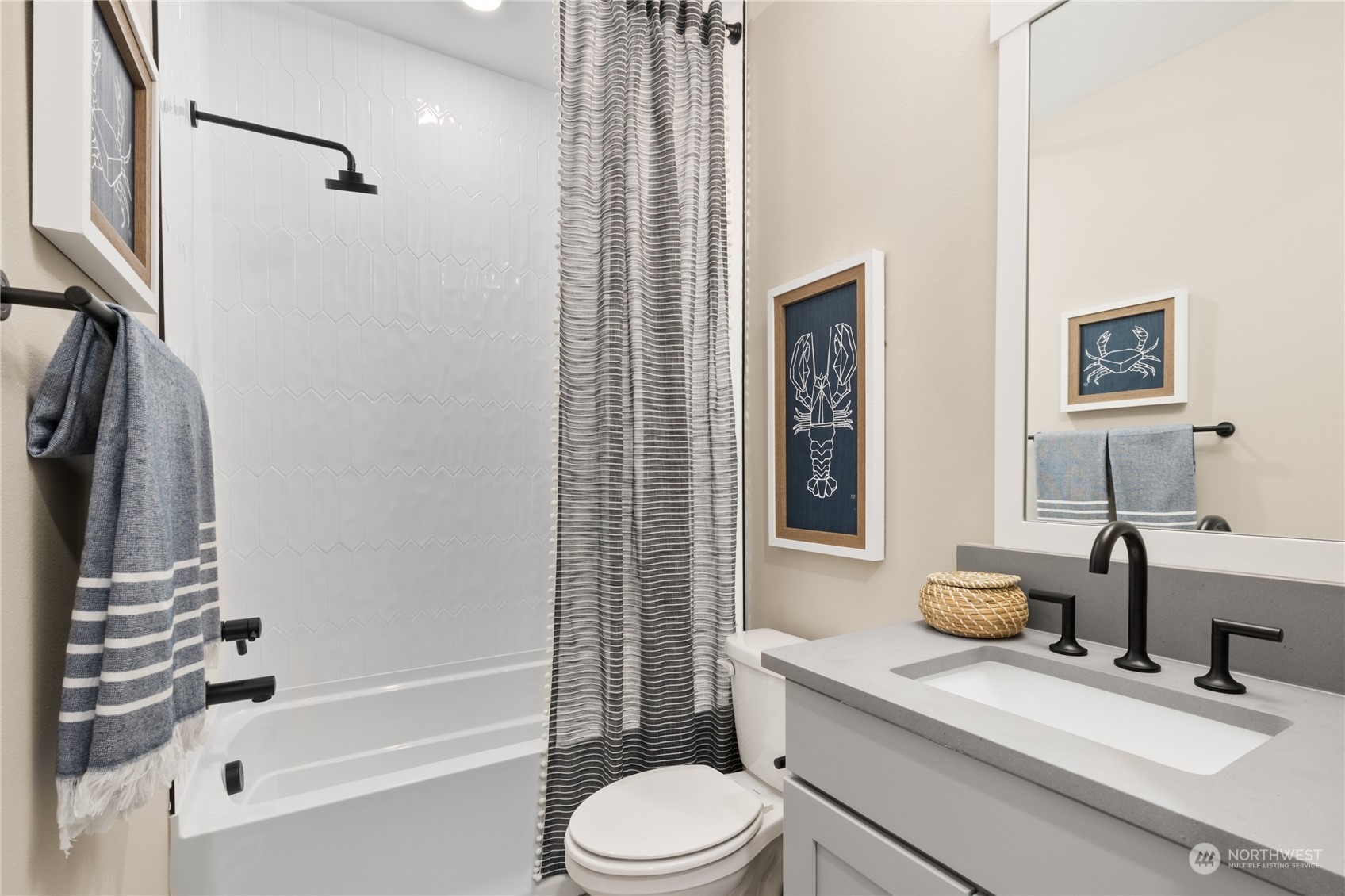 4461 Wandering Way, Unit 58 Port Orchard, WA 98367 - Photo 19 of 26 a bathroom with a granite countertop sink toilet and shower