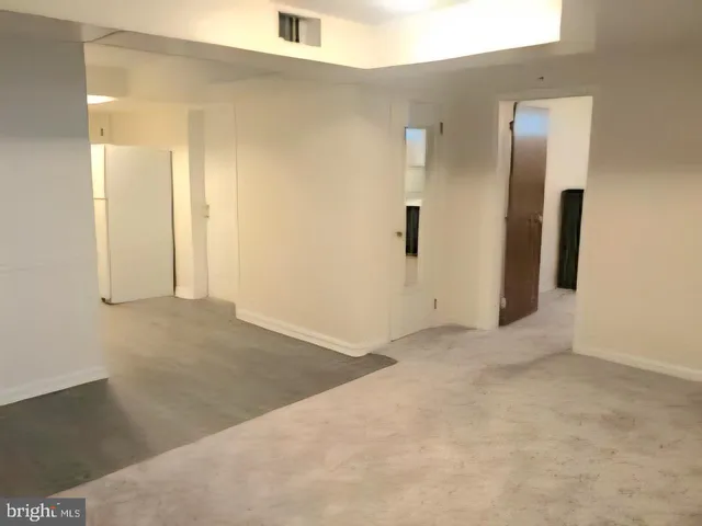 a bathroom with a toilet and a sink