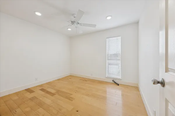 a view of a room with shelf on the wall