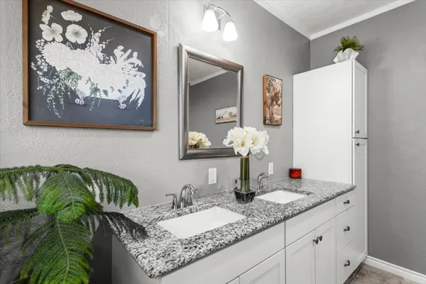 a bathroom with a toilet a sink and bathtub