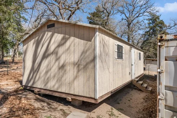 a view of a garage with storage