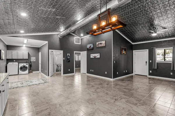 a view of a hallway with a tv