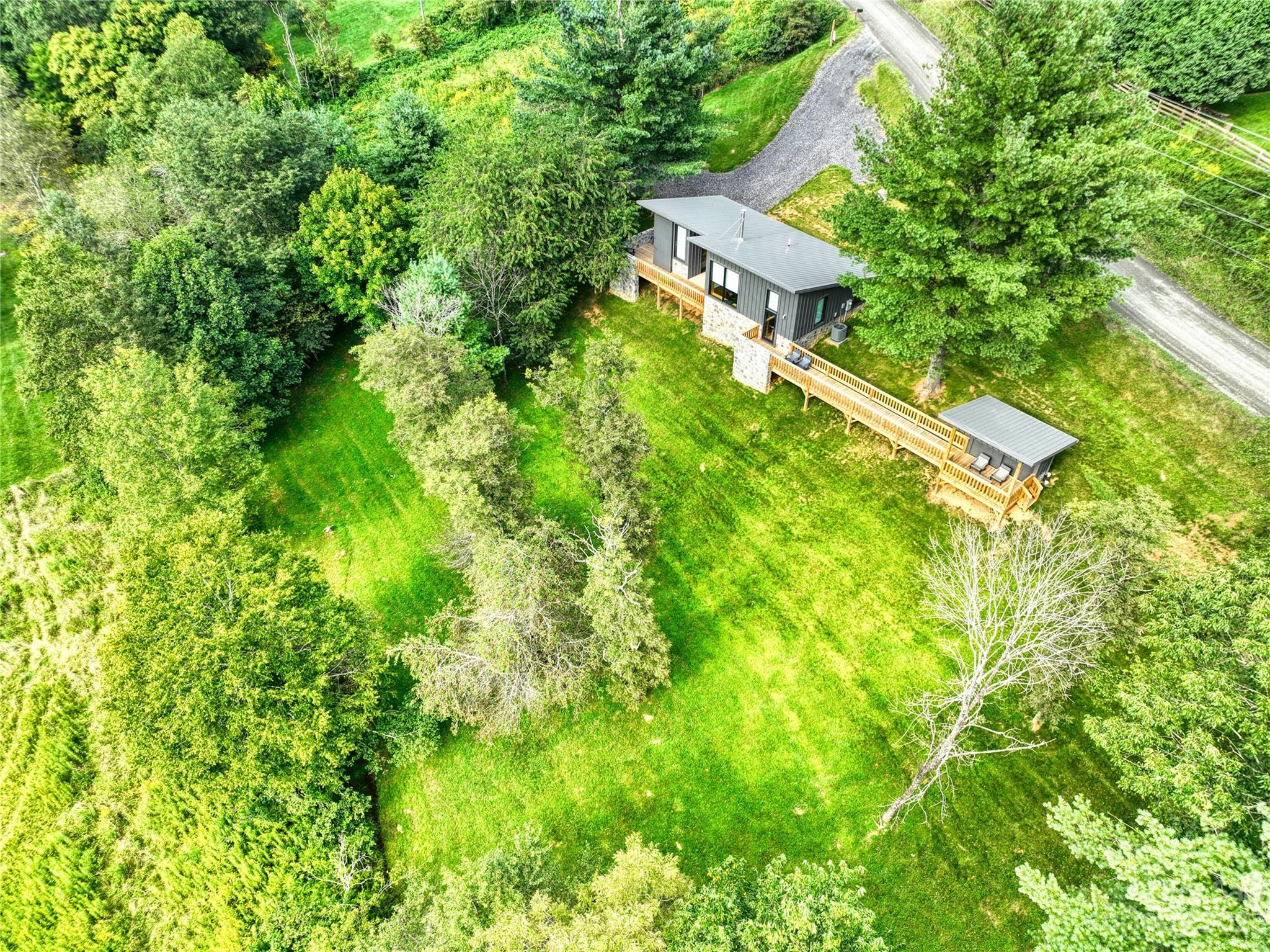 3765 Bald Mountain Road, Unit 2 West Jefferson, NC 28694 - Photo 11 of 35 an aerial view of residential house with an outdoor space