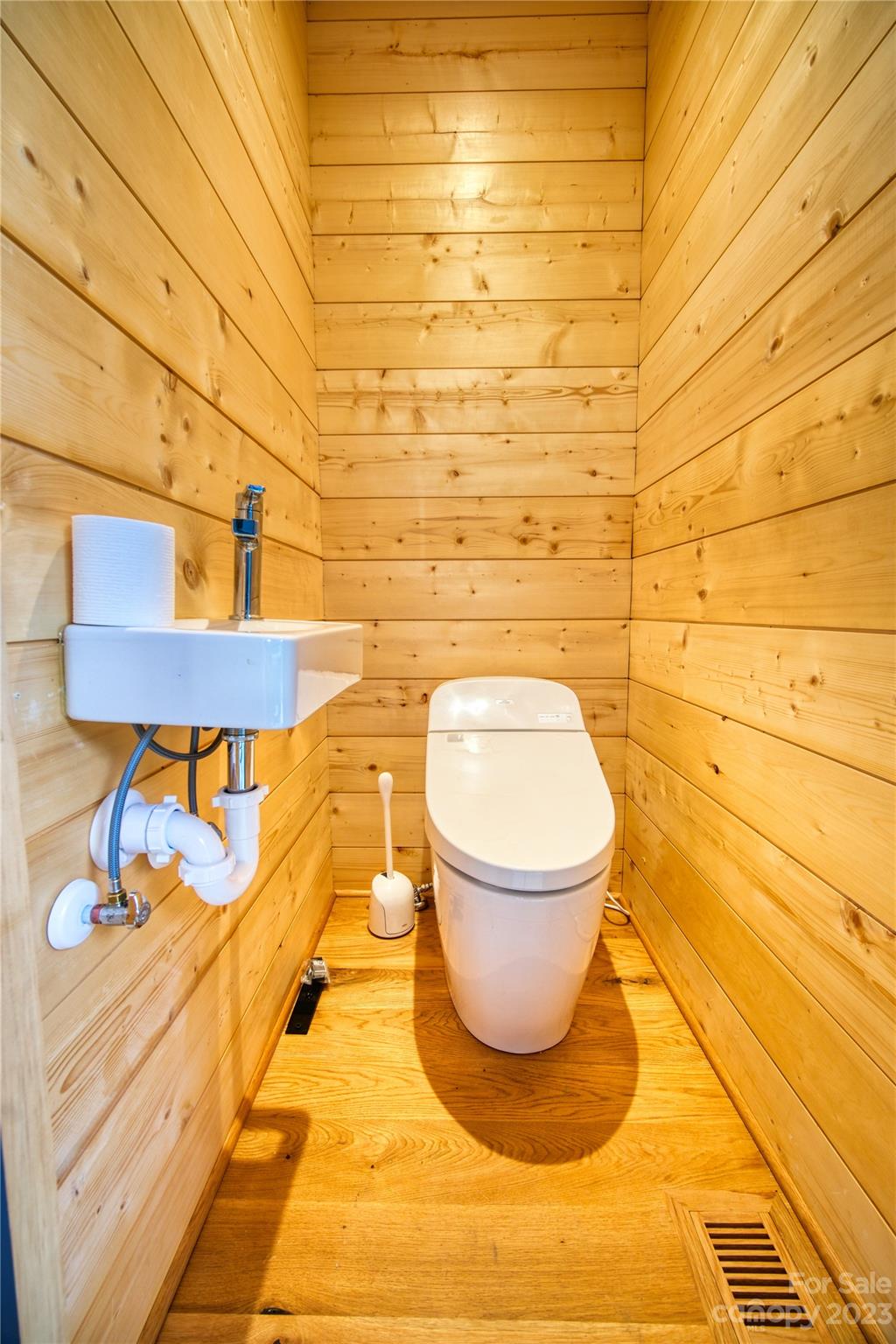 3765 Bald Mountain Road, Unit 2 West Jefferson, NC 28694 - Photo 13 of 35 a view of a bathroom with toilet and a sink