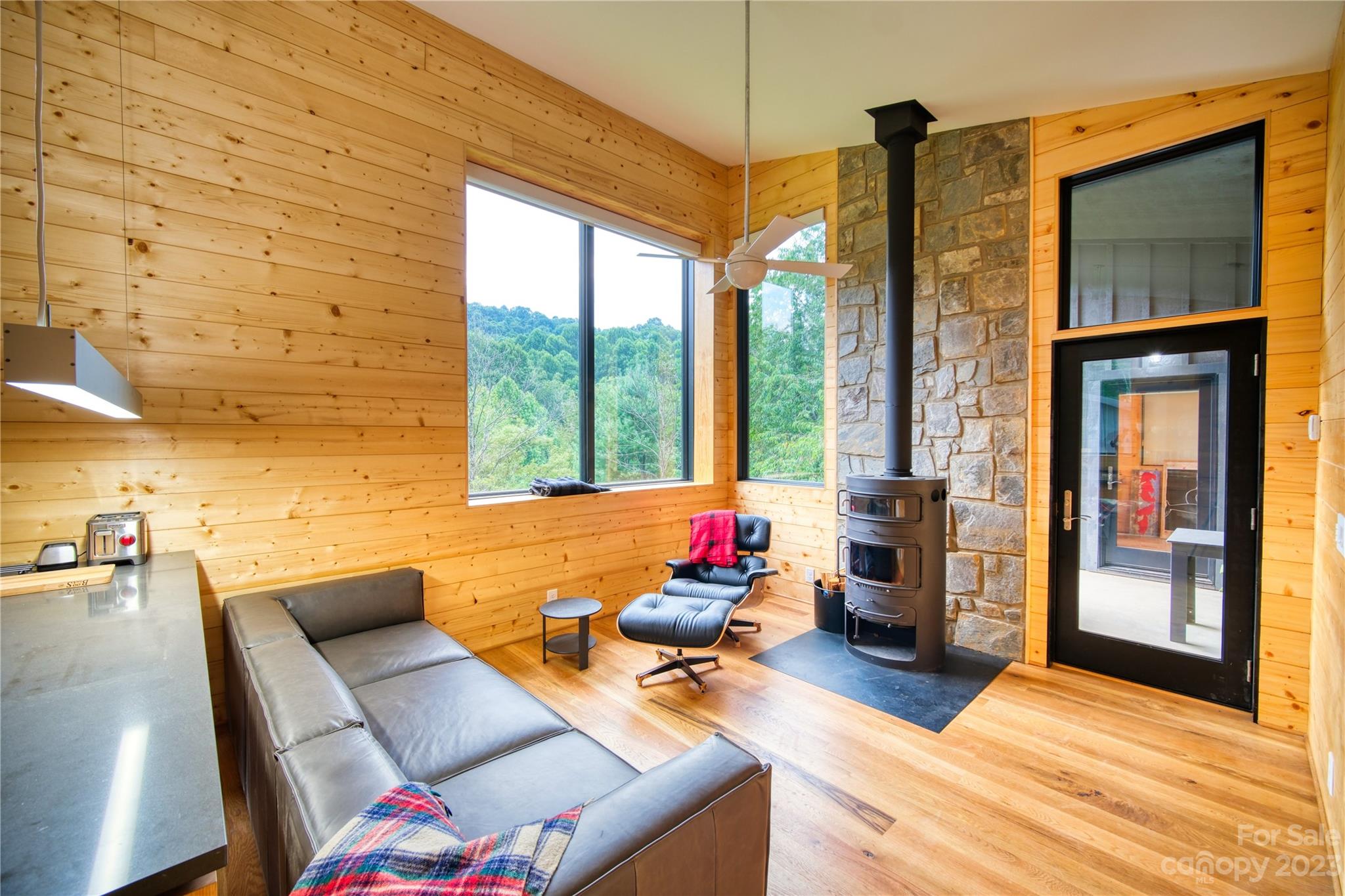 3765 Bald Mountain Road, Unit 2 West Jefferson, NC 28694 - Photo 14 of 35 a living room with furniture and a large window