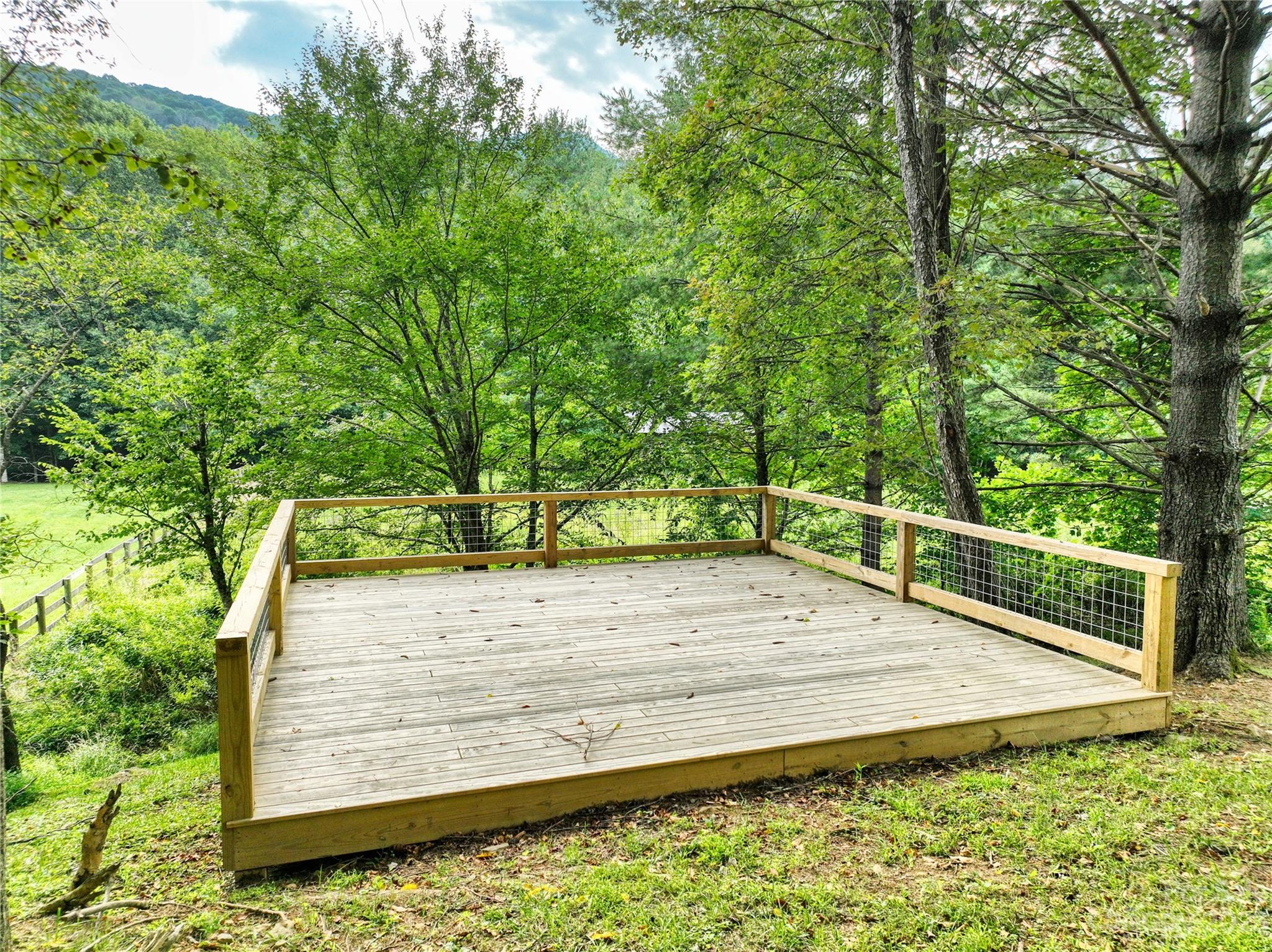 3765 Bald Mountain Road, Unit 2 West Jefferson, NC 28694 - Photo 8 of 35 a view of a backyard with barn
