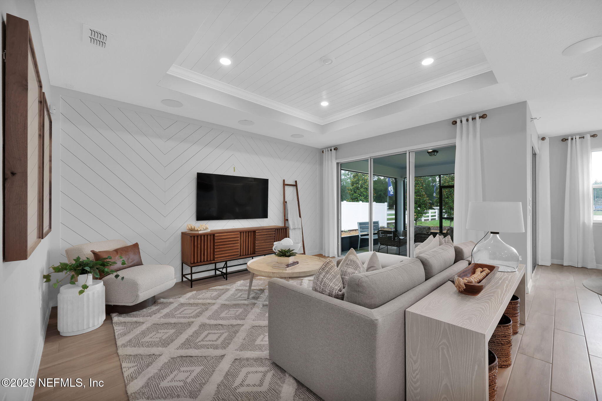 1710 Mickey Way Middleburg, FL 32068 - Photo 10 of 20 a living room with furniture and a flat screen tv