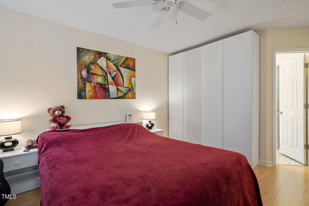 4437 Labrador Drive Raleigh, NC 27616 - Photo 19 of 25 a bedroom with a bed and a window