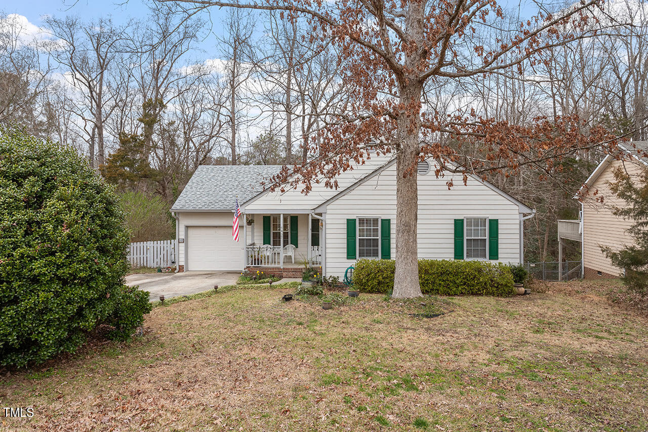 4437 Labrador Drive Raleigh, NC 27616 - Photo 2 of 25 a front view of house with yard and trees around