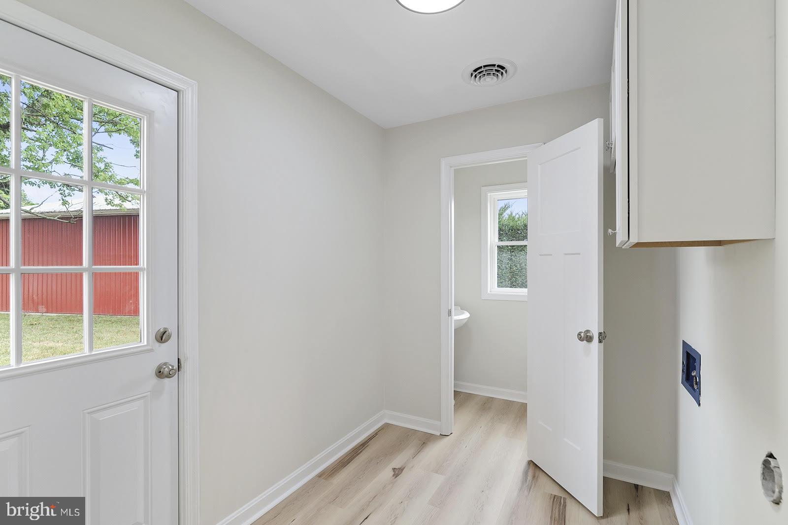 259 Dyke Branch Road Dover, DE 19901 - Photo 16 of 24 Laundry Area with Door to Outside