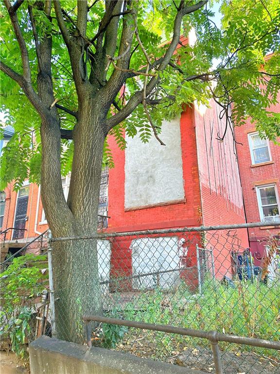 1360 Bergen Street Brooklyn, NY 11213 - Photo 2 of 3 a front view of a house with garden