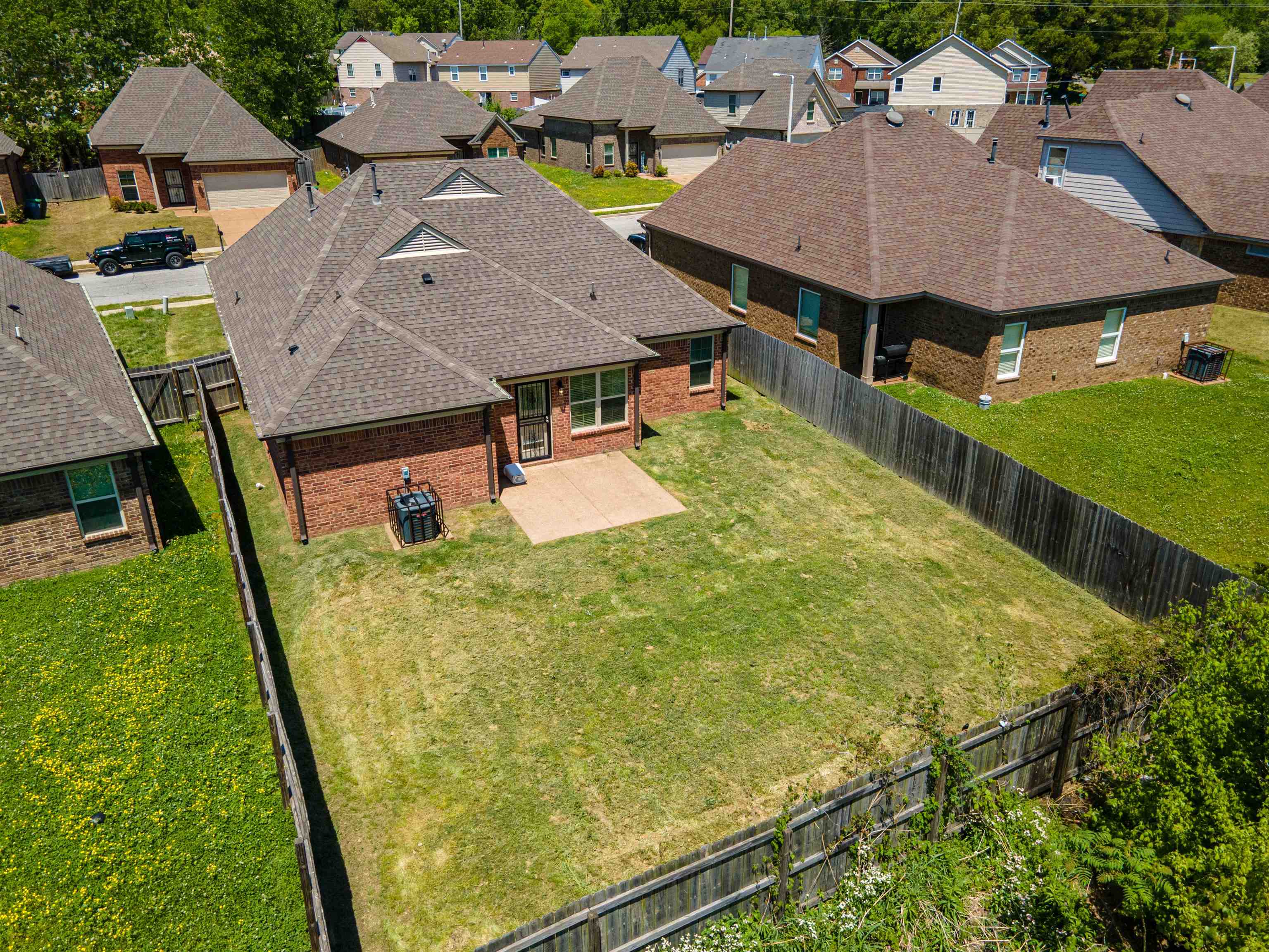 5262 Crossfield Road Memphis, TN 38109 - Photo 18 of 19 an aerial view of a house with swimming pool garden and patio