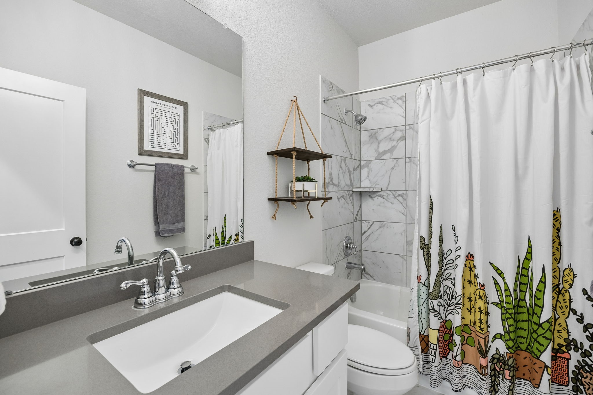 10102 South Goshawk Trail Conroe, TX 77385 - Photo 24 of 46 a bathroom with a sink toilet and shower