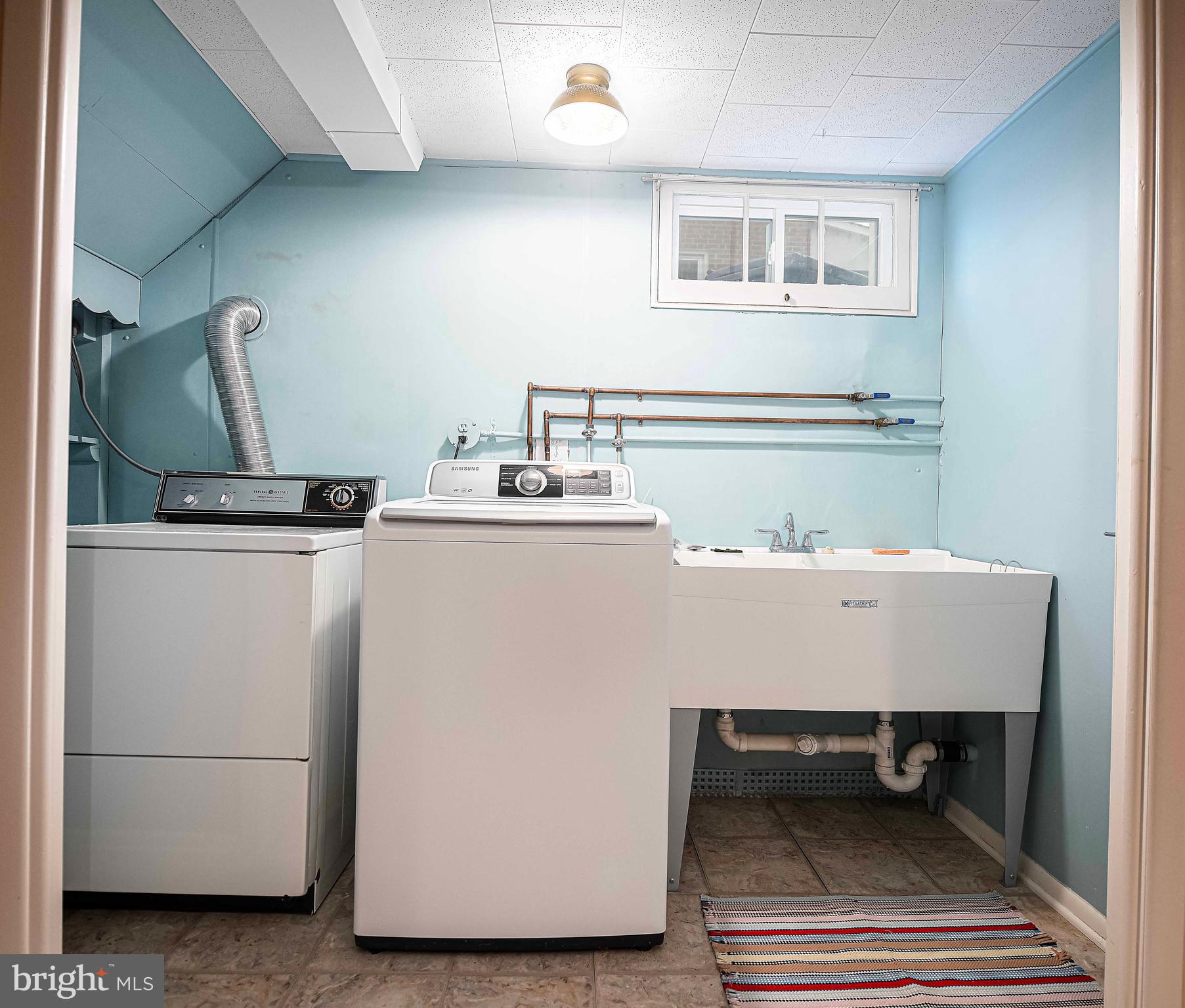 1131 Hollen Road Baltimore, MD 21239 - Photo 28 of 34 a utility room with dryer and washer