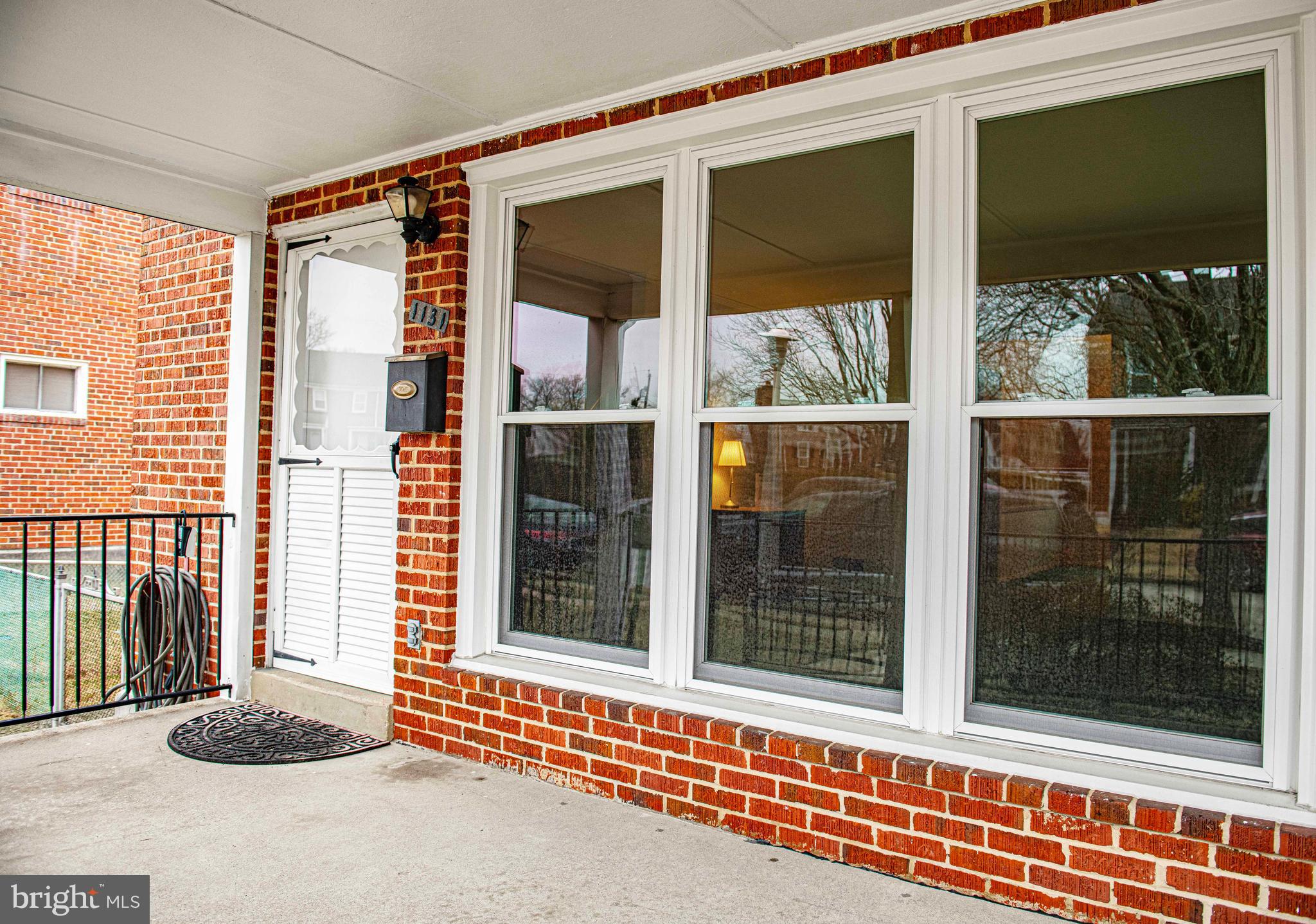 1131 Hollen Road Baltimore, MD 21239 - Photo 6 of 34 a view of a door and a window