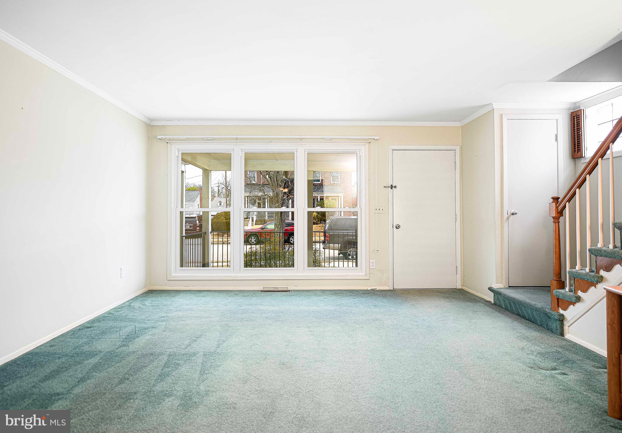 1131 Hollen Road Baltimore, MD 21239 - Photo 7 of 34 an empty room with windows