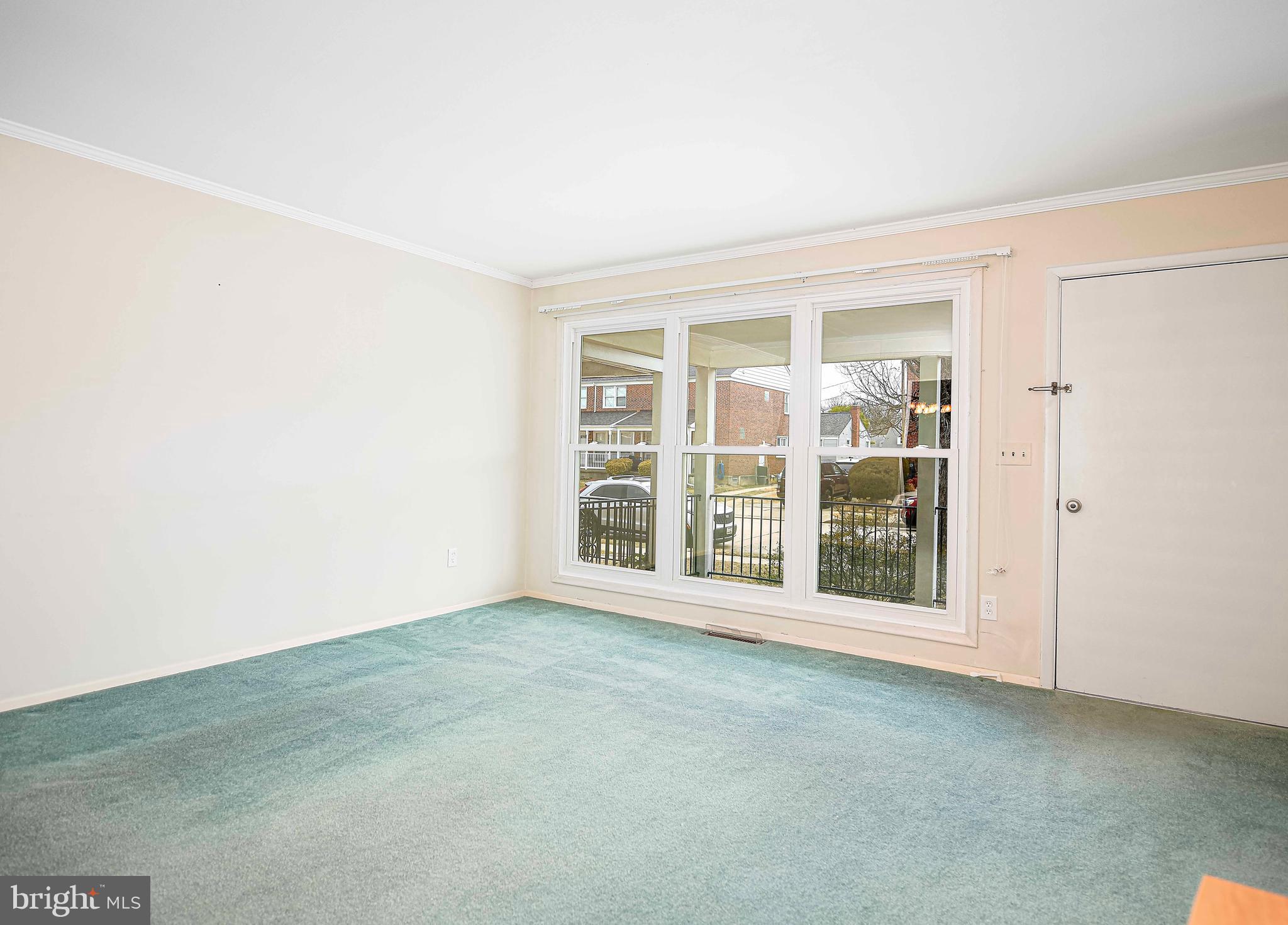 1131 Hollen Road Baltimore, MD 21239 - Photo 8 of 34 an empty room with a window