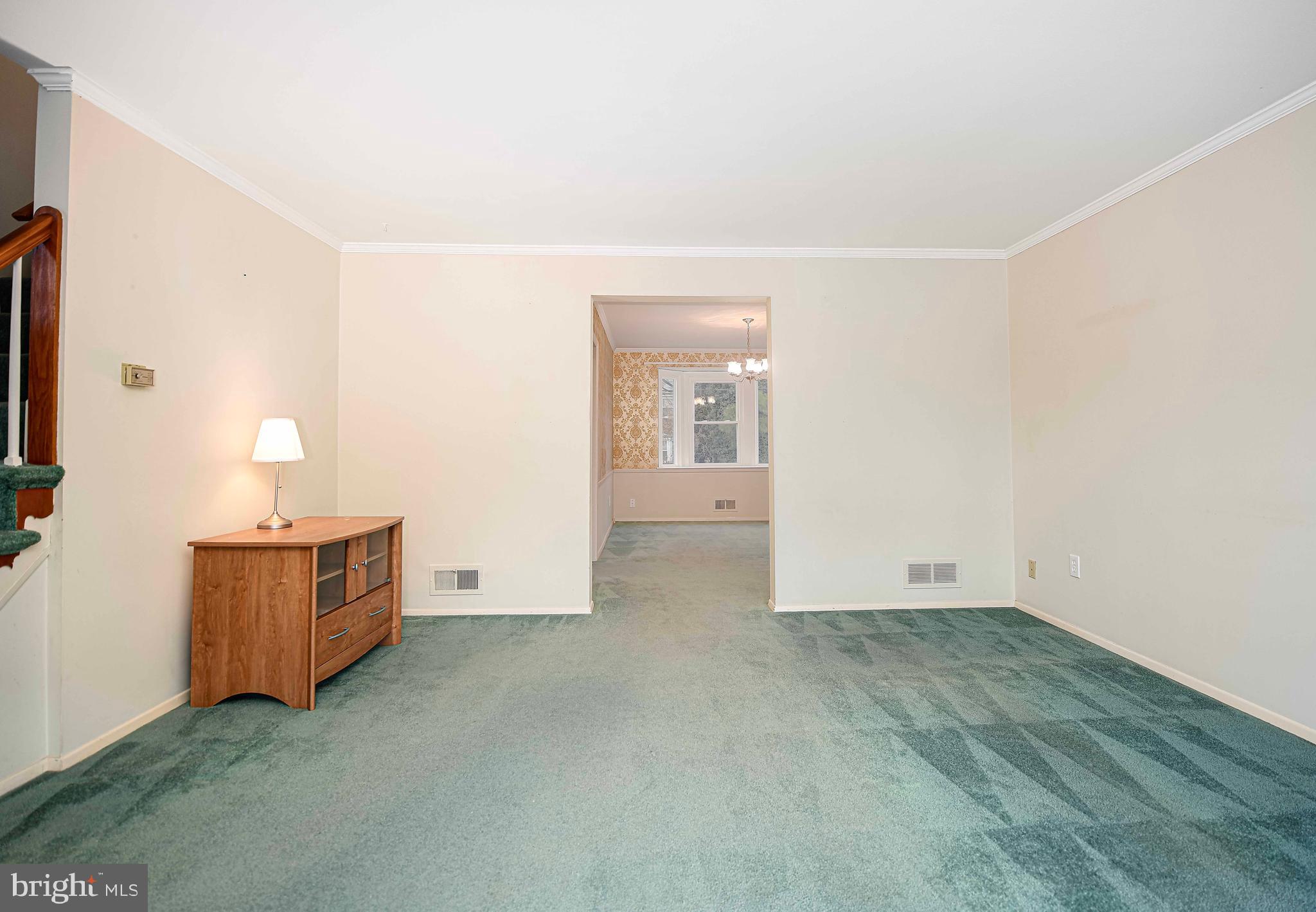 1131 Hollen Road Baltimore, MD 21239 - Photo 10 of 34 an empty room with windows