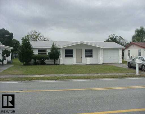 10241 Regency Park Boulevard Port Richey, FL 34668 - Photo 1 of 1 Exterior Front