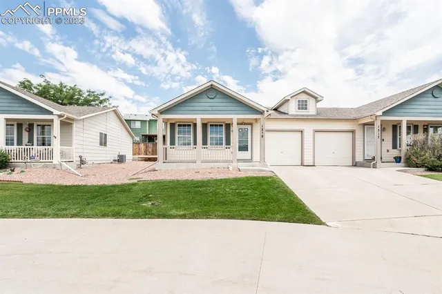 a house view with a garden space