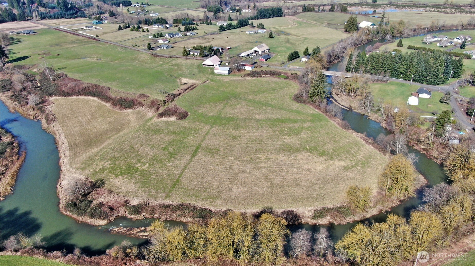 X1 Oxbow Road Raymond, WA 98577 - Photo 18 of 27 a view of a wooden table and chairs in the patio