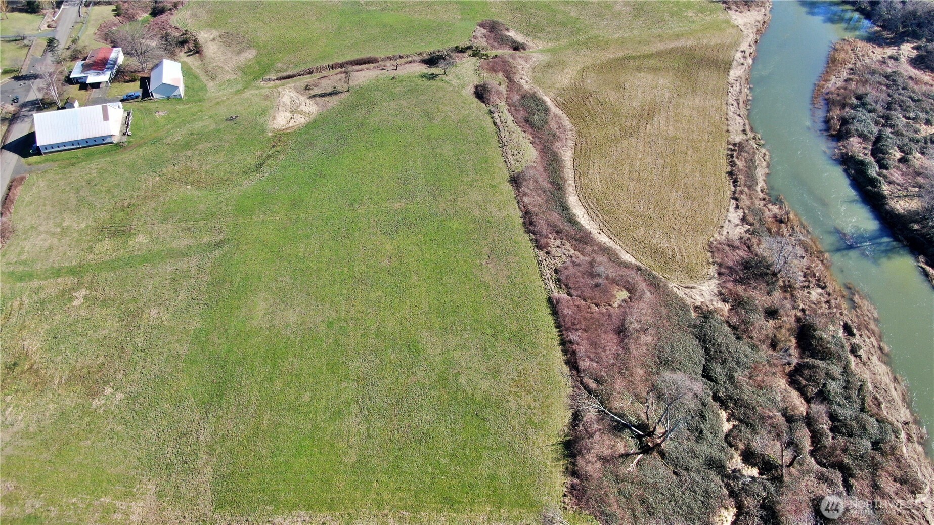 X1 Oxbow Road Raymond, WA 98577 - Photo 20 of 27 a bathroom with a shower and a mirror