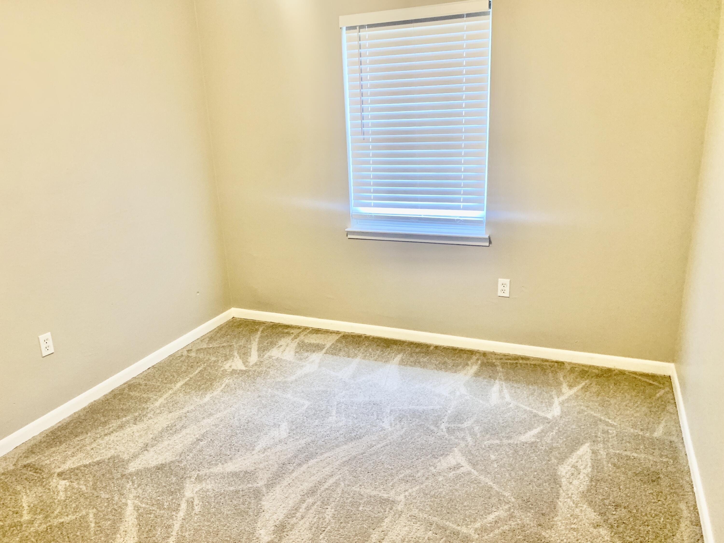 122 West 1st Avenue Crestview, FL 32536 - Photo 12 of 15 a view of an empty room
