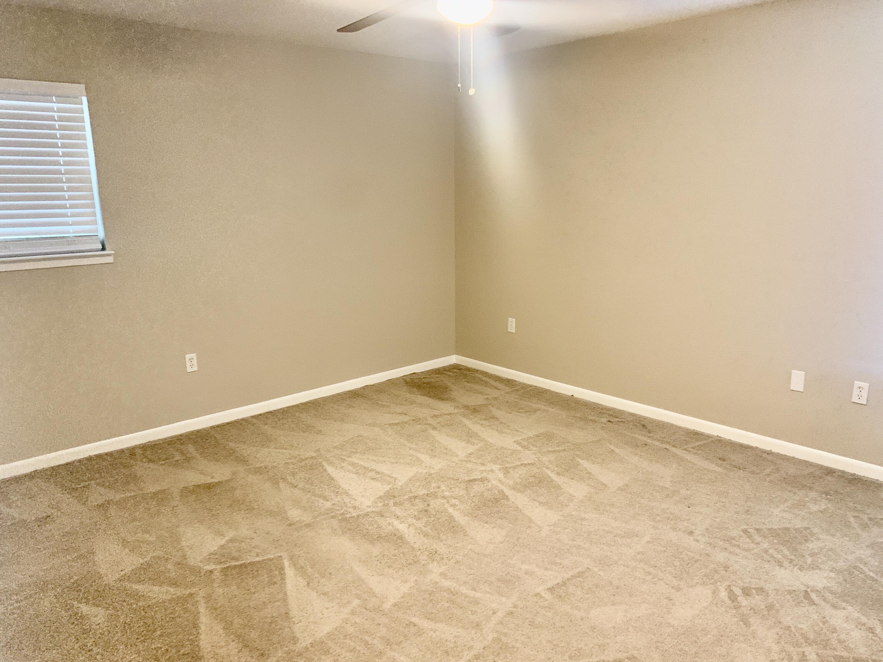 122 West 1st Avenue Crestview, FL 32536 - Photo 9 of 15 a view of an empty room