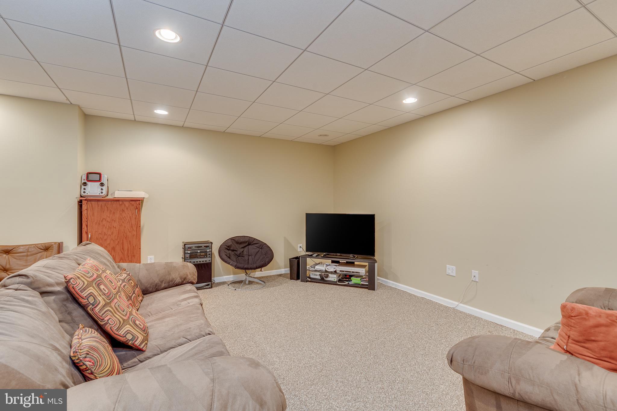 2 Dellaira Court Wrightstown, NJ 08562 - Photo 57 of 93 a bedroom with a bed and a tv on the dresser