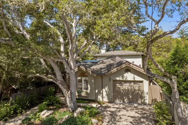 front view of a house with a trees