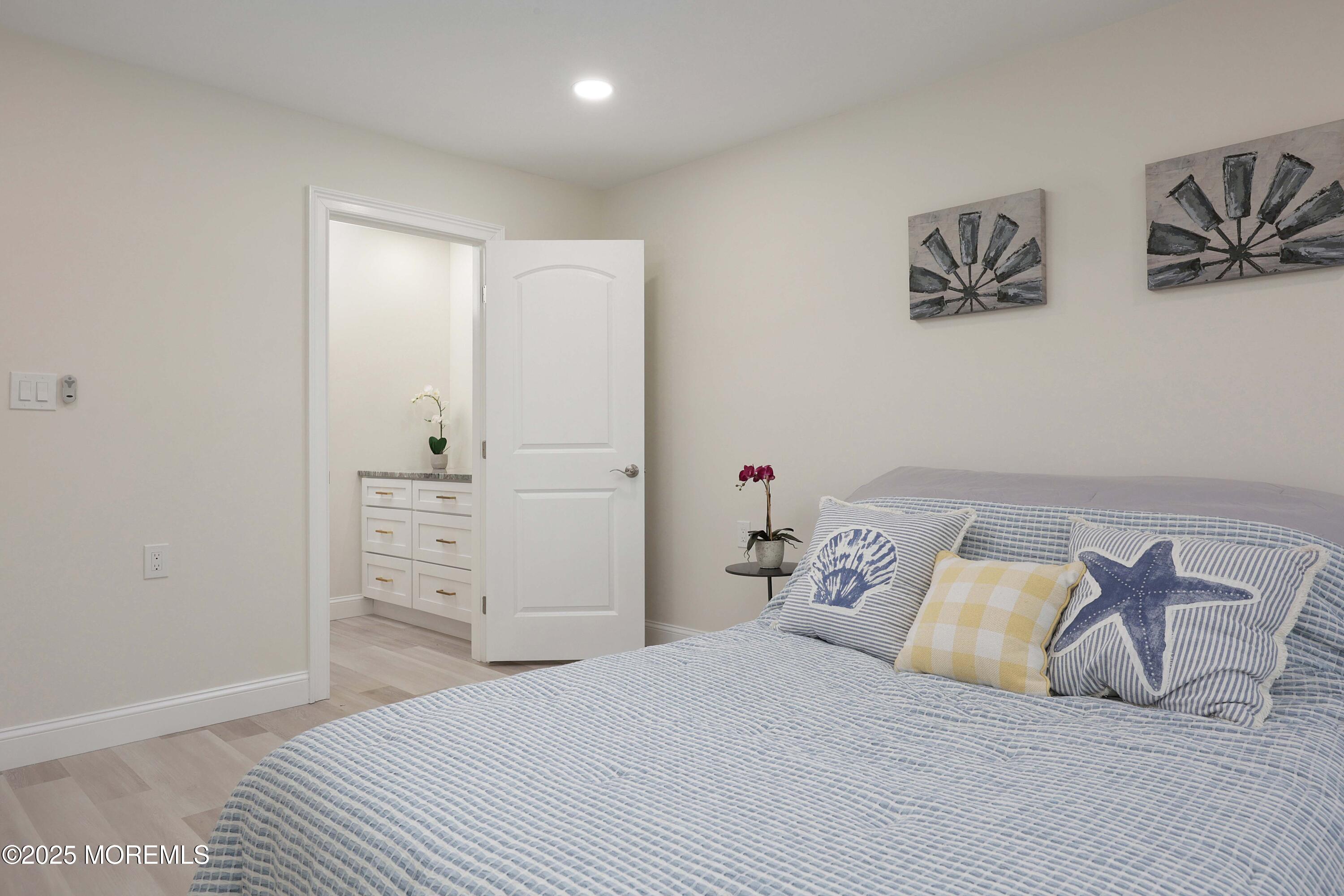 3 Auburn Court Red Bank, NJ 07701 - Photo 24 of 57 a bedroom with a bed and walk in closet