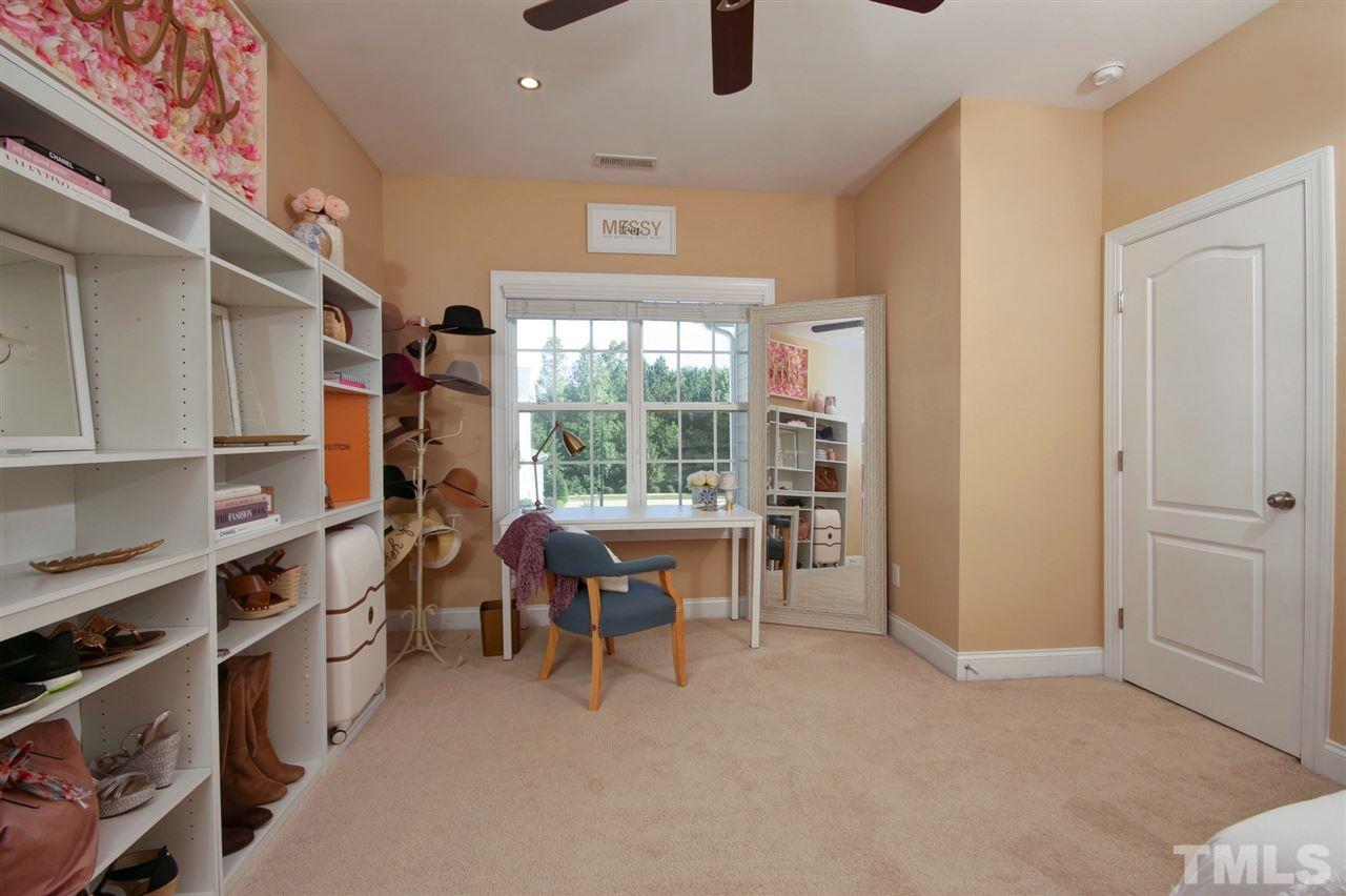 620 Democracy Street Raleigh, NC 27603 - Photo 20 of 24 Beautiful natural light and lots of storage in this room. Ample closet space as well!