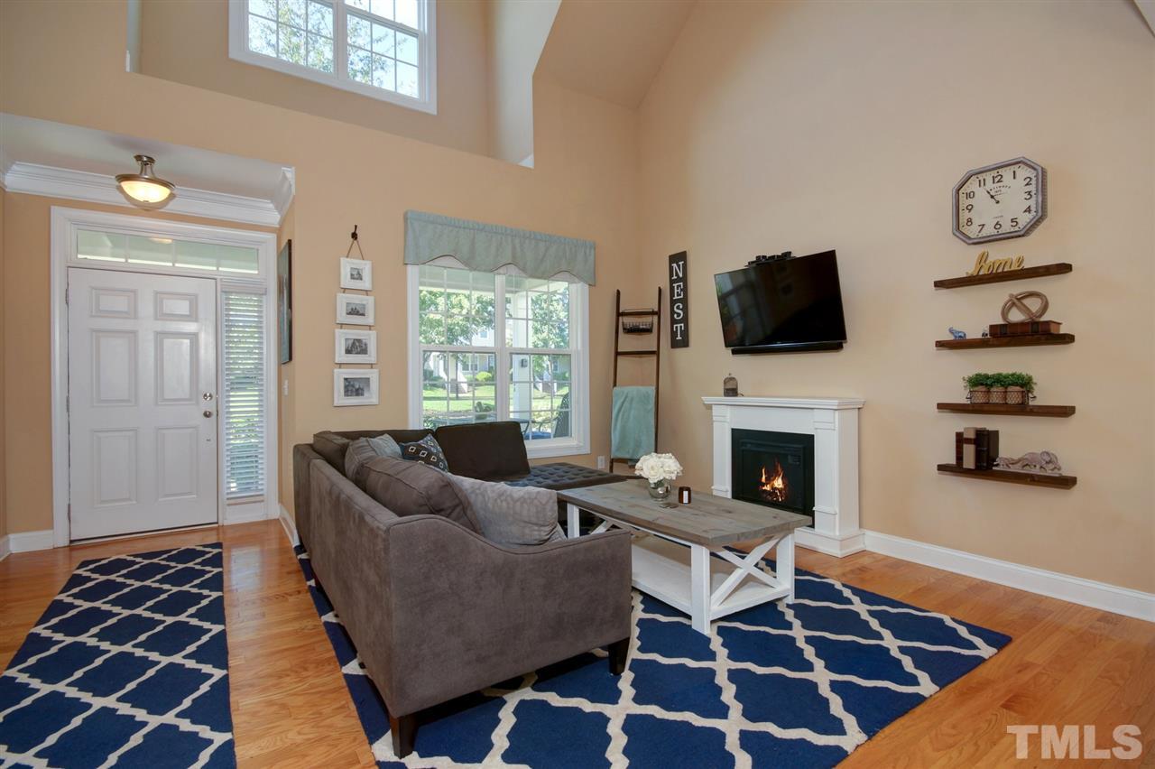 620 Democracy Street Raleigh, NC 27603 - Photo 6 of 24 Crown molding and muted paint colors are inviting and elegant.