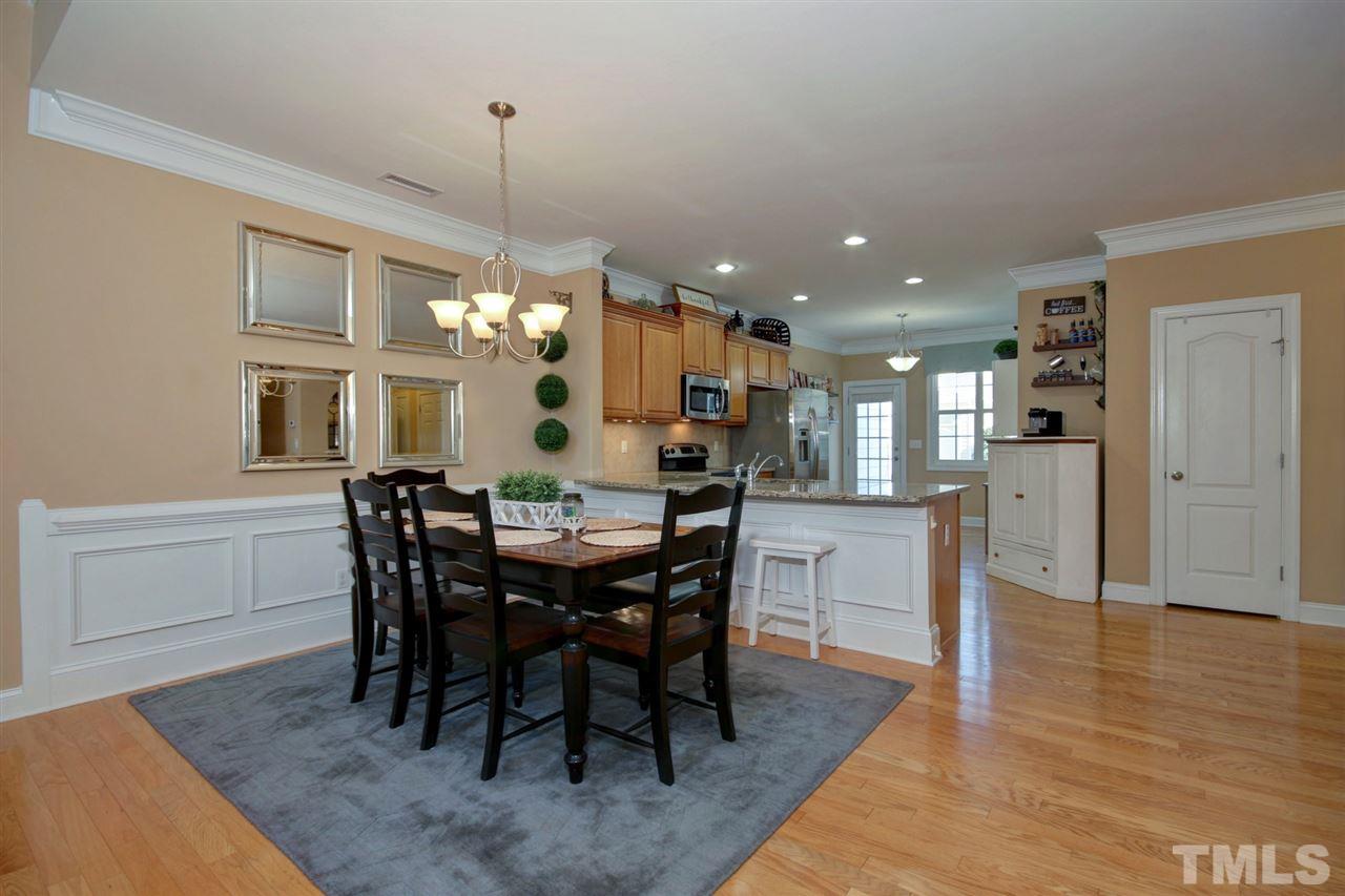 620 Democracy Street Raleigh, NC 27603 - Photo 7 of 24 Host a dinner party or throw an informal get together to watch the game without worrying about missing a thing while preparing in this open concept dining room.