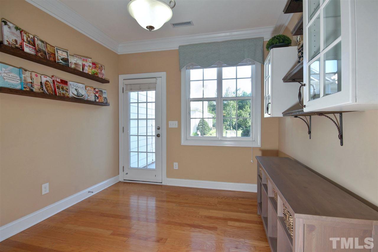 620 Democracy Street Raleigh, NC 27603 - Photo 10 of 24 Spacious eat in kitchen leads right out to the patio, which is great for grilling!