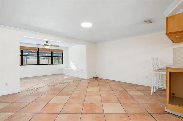 a view of an empty room and window