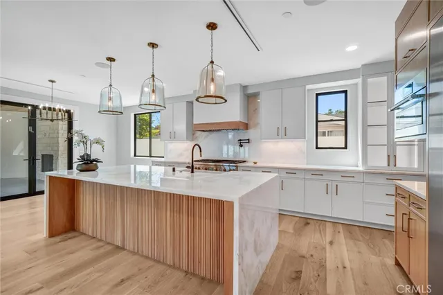 a bathroom with a granite countertop sink mirror and double