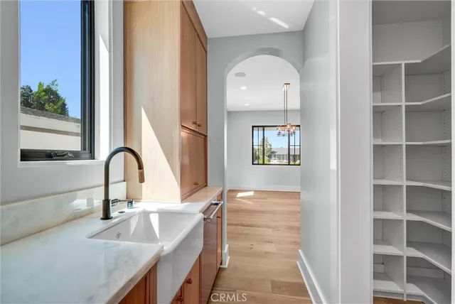 a bathroom with a toilet sink and shower